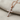 Gemstone Cross Pendant, rose gold plated finish, angled close-up view