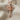 Winged Lion Sword Pendant, rose gold, front view on fabric