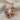 Coiled Octopus Pendant, rose gold, front view on fabric