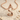 Swan Letter S Pendant, rose gold finish, product view on sand
