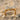 Pave Crystal Bow Ring, gold vermeil, front view on sand
