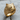 Premium 925 sterling silver grizzly bear ring with gold finish resting on a textured natural wooden log surface