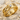 Celtic Braid Wedding Ring, gold vermeil, product view on sand