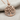 Tree of Hearts Pendant, rose plated silver, product photo on fabric