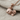 Swimming Goldfish Pendant, rose gold, product view on linen fabric