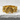 Overlapping Pebble Ring, gold vermeil, front view on white stone