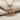 Twisted Rope Tree of Life Pendant, rose gold, flat product photo on linen fabric