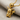 Electric Mouse Pendant, gold vermeil, angled three-quarter view on fabric