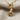 Descending Panther Pendant, gold vermeil, front view on linen