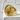 Noh Hannya Mask Ring, gold vermeil finish, angled view on stone
