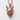 Fanged Oni Mask Pendant, rose plated silver, front view against light textured surface