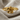 Plumeria Flower Ring, gold vermeil, product photo on linen
