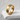 Kintsugi band ring, gold vermeil, angled side view on white shelf