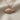 Lucky Fish Pendant in rose plated silver on fabric