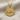 Wave Swimmer Pendant, gold vermeil, view on fabric
