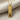 Swim Mantra Pendant, gold vermeil, angled view on fabric