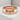 Japanese Love Ring, rose gold, studio view on stone pedestal