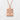 Sapporo Snowflake Pendant, rose gold, front view on white textured surface