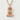 Okinawan shisa guardian pendant, rose plated silver, front view