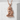 Okinawan Shisa Lion Pendant, rose gold, front view on stone block