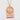 Fukuoka Ramen Pendant, rose gold, front view on textured surface