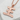 King Kanji Pendant, rose gold finish, angled view on stone