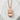 Spam Musubi Pendant, rose plated silver finish, front view on white stone