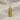 Luwian Life Hieroglyph Earring, gold vermeil, front view on fabric