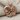 Mother Child Embrace Pendant, rose gold, front view on fabric