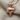 Thumbs Down Pendant, rose gold plated silver, product photo on fabric