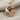 Dolphin Wave Pendant, rose gold, flat lay product photo on chain