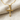 Passion Nail Cross Pendant, gold vermeil, front view on linen fabric
