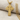 Russian Orthodox Cross Pendant, gold vermeil, product photo on linen fabric