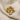 INRI Jesus Cross Ring, gold vermeil, front view on linen