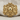 Pirate Crossbones Skull Ring, gold vermeil, front view on textile fabric