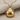 Domed ladybug beetle pendant, gold vermeil, front view on fabric