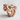 Serpent Wrap Ring, rose gold, angled view on surface