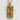 Gothic Demon Pendant in gold vermeil, front view against textured wall