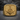 Masonic Letter G Signet Ring, gold vermeil, front view on stone surface