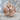 Scottish Rite Lapel Pin, rose gold, angled view on stone