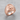 Masonic Flame Ring, rose gold, angled view on stone surface
