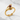 Lilith Hand Garnet Ring, gold vermeil finish on textured surface