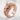 Japanese Dragon Ruby Ring, rose gold finish, front view on stone surface