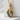 Labradorite Dragon Claw Pendant, gold vermeil, front view on stone pedestal