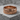 Lord's prayer ring, rose gold, product photo on stone block
