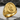 San Judas Signet Ring, gold vermeil, product photo on stone surface