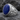 Lapis Anchor Ring in polished silver, side angle on stone slab