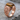 Scottish Rite Eagle Gemstone Ring, rose plated silver, side view on stone surface