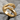Embracing Hands Hug Ring, gold vermeil, product photo on stone