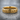 Believe Band Ring, gold vermeil, front view resting on stone surface